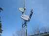 HughesNet Satellite Antenna Dish mounted below DishNet TV dish